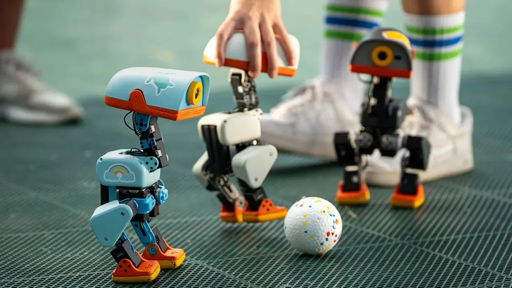 Microduck robotic companion duck demonstrating autonomous locomotion and voice response