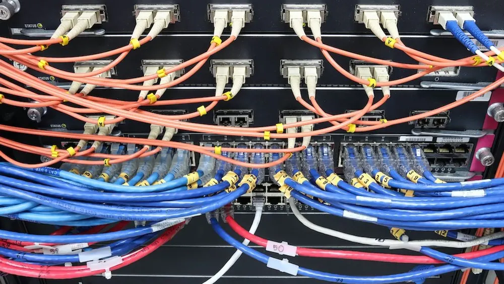Data center server routing infrastructure with illuminated fiber optic indicators and secure terminal diagnostics