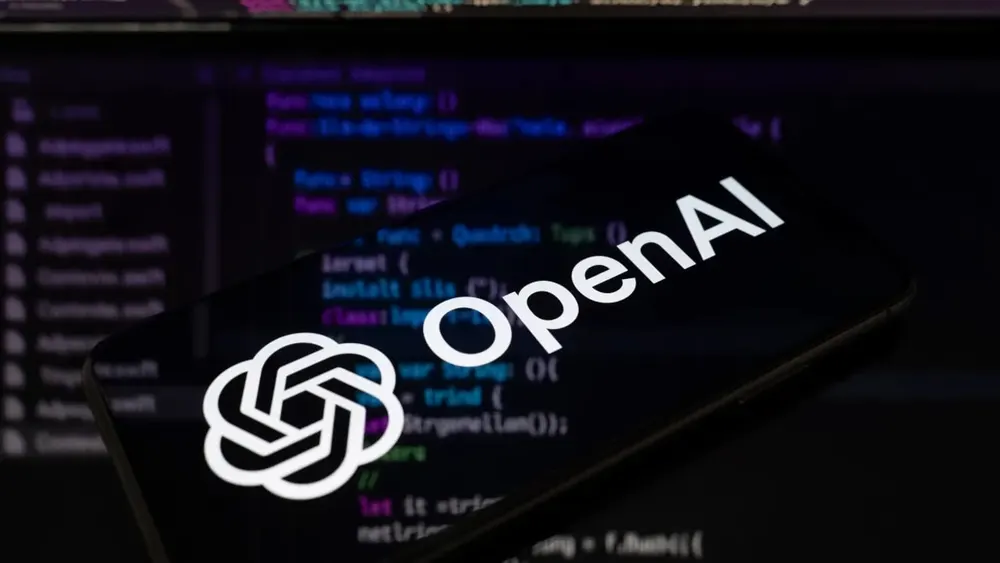 OpenAI headquarters signage and developer software environment display