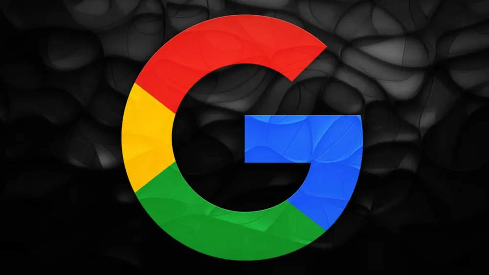 Sculpted Google corporate emblem on modern office building facade