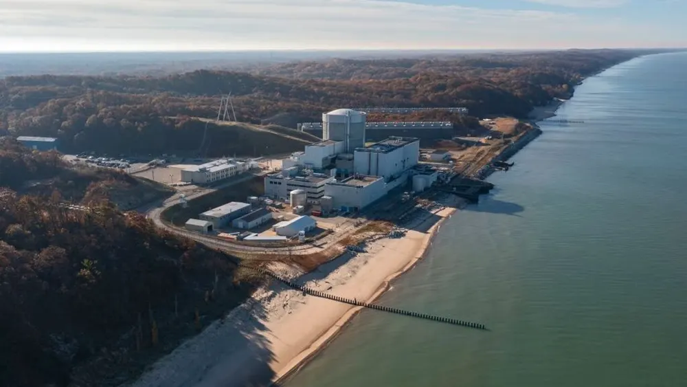 Exterior facility buildings of the Palisades nuclear generating station along the Lake Michigan shoreline