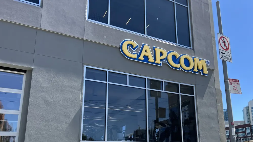 Capcom corporate logo and online gaming network security operations center display