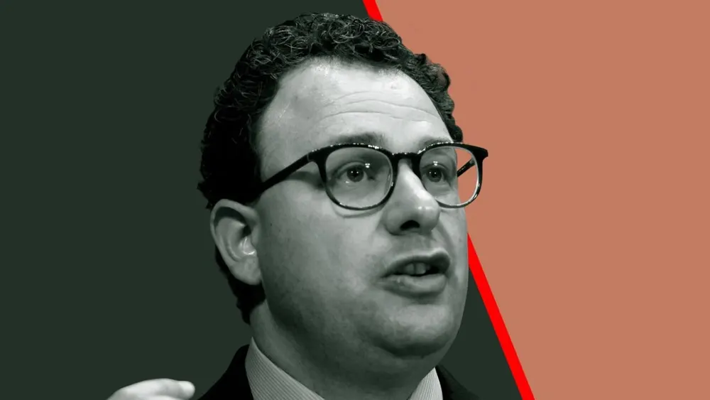 Portrait of Anthropic co-founder and CEO Dario Amodei speaking at an industry technology briefing