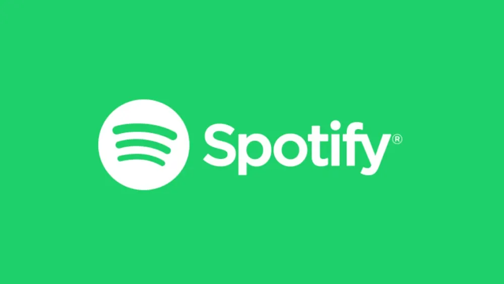 Spotify branding and mobile streaming interface on green backdrop