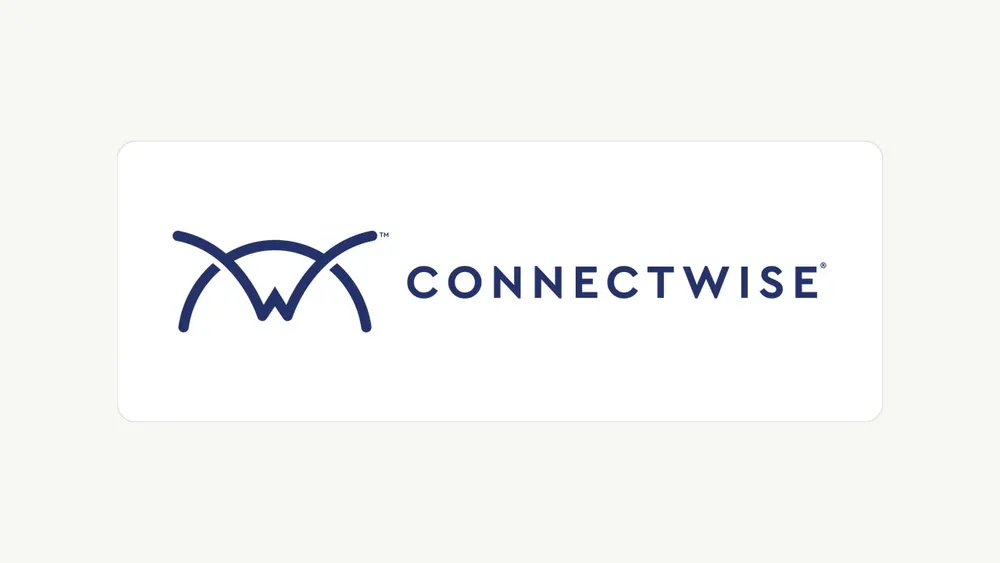 ConnectWise corporate logo rendered in dark navy blue inside a rounded white card centered on a warm editorial backdrop