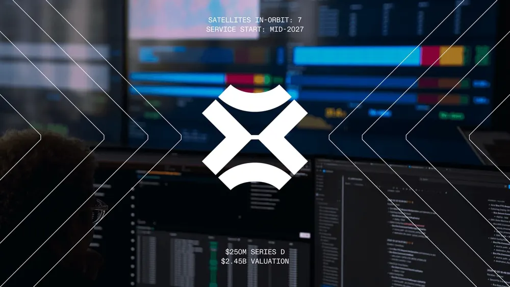 Xona Space Systems mission control visualization showing active constellation telemetry screens beneath the centered white geometric Pulsar logo